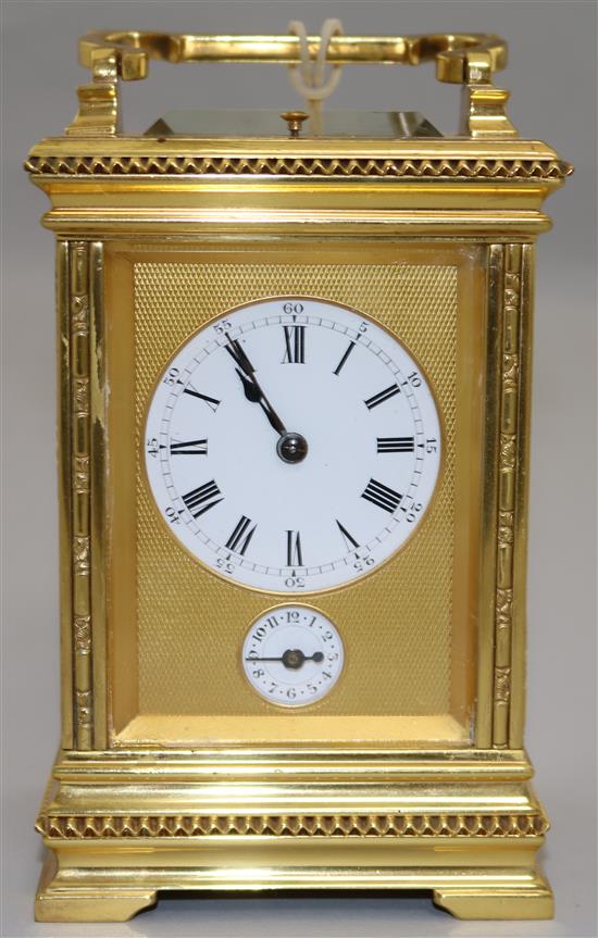 A late 19th century French hour repeating ormolu carriage clock, 6in.